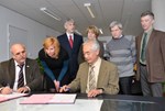 Anatoly Krasilnikov, head of the Russian Domestic Agency; Daniela Puttman; Michael Walsh, head of the Diagnostic Division; Francoise Flament, head of the Procurement and Contract Division; ITER Director-General Motojima; and Luciano Bertalot and Robin Barnsley from the Diagnostics Division. 